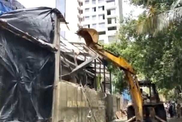 Mumbai: Illegal portion of the bar in Juhu where Worli hit and run case accused went before the accident, is being demolished by BMC.
 - X/ANI